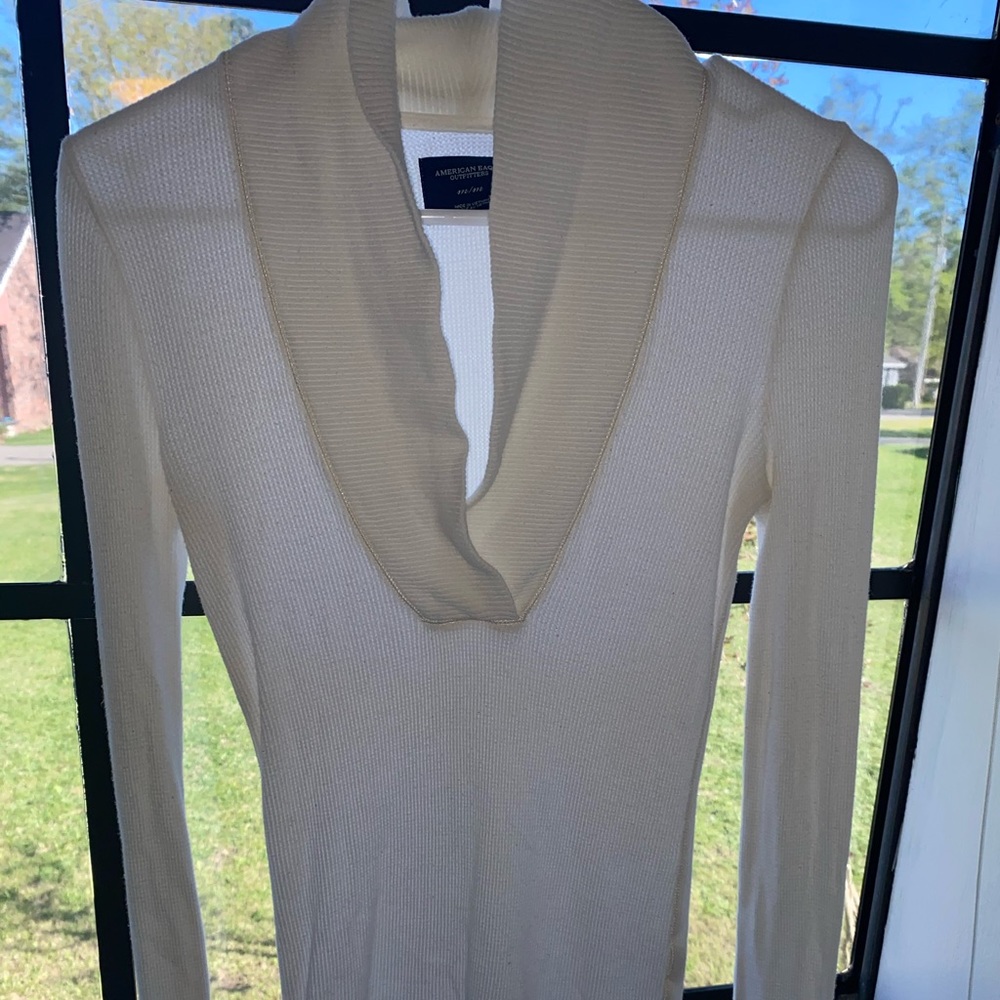 A all white American eagle long sleeve shirt.